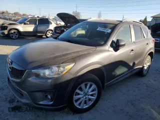 2014 Mazda CX-5 Touring z VIN JM3KE2CY1E0387874, wystawiony jako Copart lot #42248045 z przebiegiem 83 826 mil mil oraz Szkoda całkowita • Salvage title. Historia ofert i sprzedaży dostępna na DreamBid. Obrazek 1.