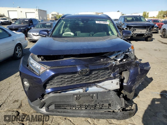 2019 Toyota RAV4 XLE with VIN JTMP1RFV8KD513544, listed as a Copart auction lot 73611684 with Not Provided miles and Salvage Title. Bid and sale history available at DreamBid. Image 5.