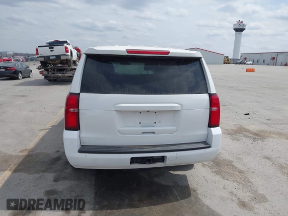 2020 Chevrolet Tahoe Commercial z VIN 1GNSKDEC9LR260983, wystawiony jako IAAI lot #42062097 z przebiegiem 124 911 mil mil oraz . Historia ofert i sprzedaży dostępna na DreamBid. Obrazek 16.