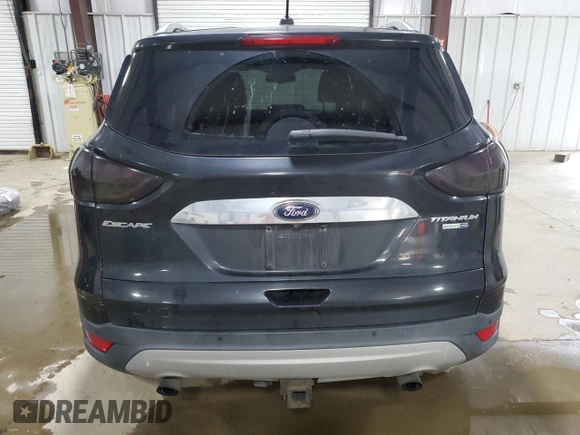 2015 Ford Escape Titanium with VIN 1FMCU9J91FUB77592, listed as a Copart auction lot 62727355 with 94,131 mi miles and Salvage title. Bid and sale history available at DreamBid. Image 6.