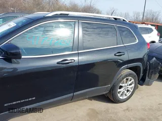 2015 Jeep Cherokee North with VIN 1C4PJMCS4FW792918, listed as a IAAI auction lot 41748651 with 107,034 mi miles. Bid and sale history available at carsss.com. Image 15.