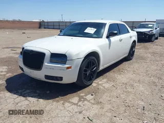 2009 Chrysler 300 Touring with VIN 2C3KA53V89H634048, listed as a IAAI auction lot 41974629 with Not Provided miles and . Bid and sale history available at DreamBid. Image 17.
