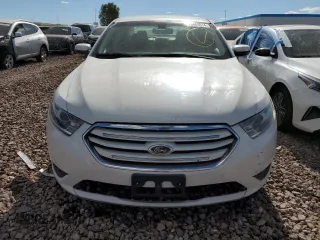 2015 Ford Taurus SEL with VIN 1FAHP2E92FG172960, listed as a Copart auction lot 84866524 with 115,115 mi miles and Salvage Title. Bid and sale history available at DreamBid. Image 5.
