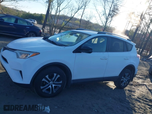 2017 Toyota RAV4 LE with VIN JTMZFREV5HJ701508, listed as a IAAI auction lot 41854606 with 175,000 mi miles and . Bid and sale history available at DreamBid. Image 14.