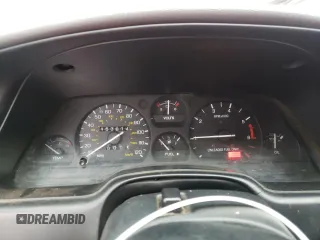 1996 Ford Thunderbird LX with VIN 1FALP62W8TH174603, listed as a Copart auction lot 72928574 with 153,614 mi miles and Salvage Title. Bid and sale history available at DreamBid. Image 9.