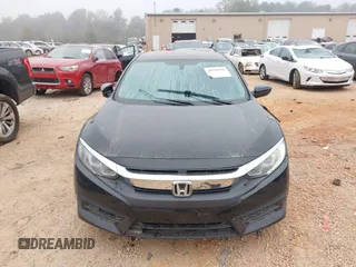 2018 Honda Civic LX with VIN 2HGFC2F55JH595412, listed as a IAAI auction lot 40510936 with 74,359 mi miles and . Bid and sale history available at DreamBid. Image 6.