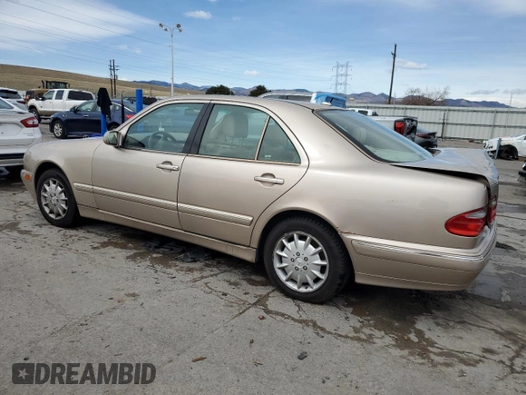 2000 Mercedes-Benz E-Class with VIN WDBJF82J0YX040071, listed as a Copart auction lot 50001165 with 145,638 mi miles and Salvage Title. Bid and sale history available at carsss.com. Image 2.