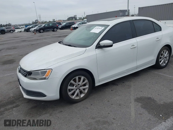 2014 Volkswagen Jetta Sedan SE w/Connectivity/Sunroof PZEV with VIN 3VWD17AJ6EM420961, listed as a IAAI auction lot 42107575 with 198,329 mi miles. Bid and sale history available at carsss.com. Image 2.