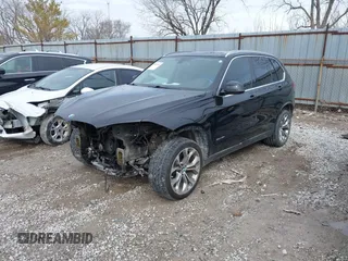 2015 BMW X5 sDrive35i z VIN 5UXKR2C54F0H35091, wystawiony jako IAAI lot #41621452 z przebiegiem 92 919 mil mil oraz . Historia ofert i sprzedaży dostępna na DreamBid. Obrazek 21.