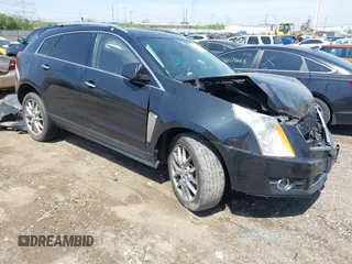 2014 Cadillac SRX Premium Collection z VIN 3GYFNGE38ES616370, wystawiony jako IAAI lot #42073614 z przebiegiem 149 078 mil mil oraz . Historia ofert i sprzedaży dostępna na DreamBid. Obrazek 1.