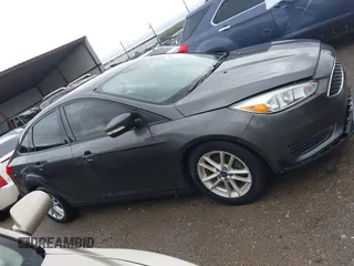 2015 Ford Focus SE with VIN 1FADP3F28FL219552, listed as a IAAI auction lot 41959648 with 128,590 mi miles. Bid and sale history available at carsss.com. Image 13.