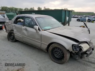 2002 Acura RL z VIN JH4KA96502C009276, wystawiony jako Copart lot #53978405 z przebiegiem 221 090 mil mil oraz Szkoda całkowita • Salvage title. Historia ofert i sprzedaży dostępna na DreamBid. Obrazek 4.