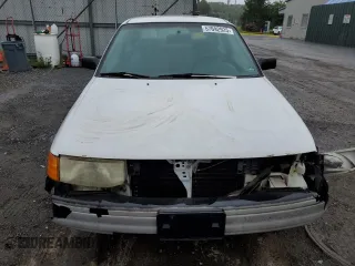 1992 Ford Escort z VIN 1FAPP11J5NW167729, wystawiony jako Copart lot #57692925 z przebiegiem 73 341 mil mil oraz Tytuł czysty. Historia ofert i sprzedaży dostępna na DreamBid. Obrazek 5.
