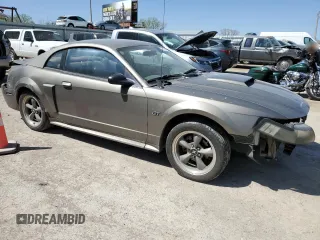 2002 Ford Mustang GT Deluxe with VIN 1FAFP42X62F224855, listed as a Copart auction lot 52753995 with 231,592 mi miles and Salvage title. Bid and sale history available at DreamBid. Image 4.