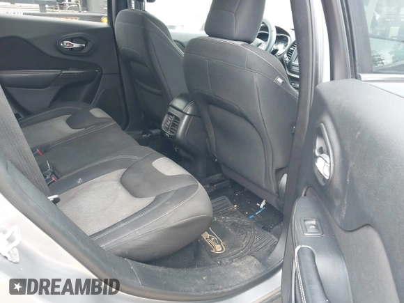 2014 Jeep Cherokee Latitude with VIN 1C4PJLCS1EW105984, listed as a IAAI auction lot 42242732 with 89,325 mi miles and . Bid and sale history available at DreamBid. Image 8.