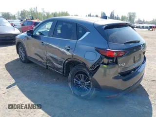 2020 Mazda CX-5 Touring with VIN JM3KFBCM6L1828691, listed as a IAAI auction lot 42100409 with 25,182 mi miles. Bid and sale history available at carsss.com. Image 3.