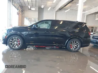 2021 Dodge Durango R/T with VIN 1C4SDJCT1MC788493, listed as a IAAI auction lot 41213673 with 80,287 mi miles and . Bid and sale history available at DreamBid. Image 14.