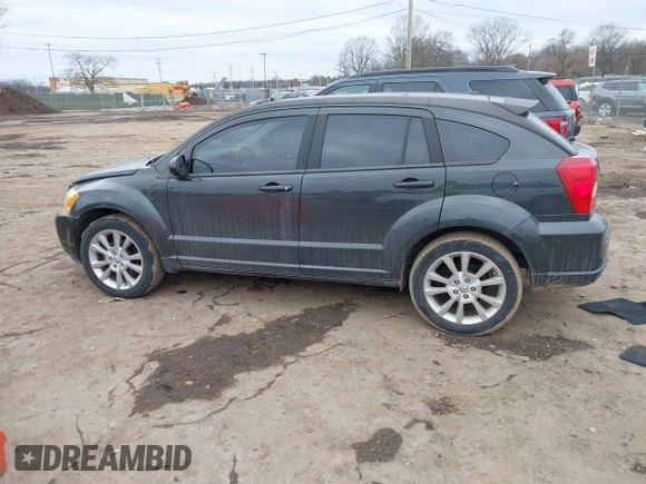 2011 Dodge Caliber Heat with VIN 1B3CB5HA7BD110672, listed as a IAAI auction lot 41709487 with 59,679 mi miles and . Bid and sale history available at DreamBid. Image 14.