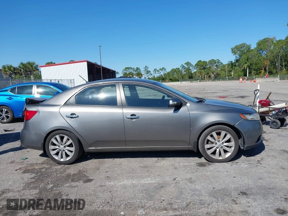 2010 Kia Forte SX with VIN KNAFW4A30A5312314, listed as a IAAI auction lot 41731007 with 169,466 mi miles. Bid and sale history available at carsss.com. Image 12.