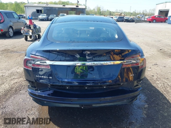 2013 Tesla Model S z VIN 5YJSA1CN5DFP20579, wystawiony jako IAAI lot #41983339 z przebiegiem 80 118 mil mil oraz . Historia ofert i sprzedaży dostępna na DreamBid. Obrazek 6.