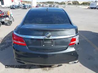 2014 Buick LaCrosse Leather with VIN 1G4GB5G32EF101207, listed as a IAAI auction lot 41361057 with 114,832 mi miles and . Bid and sale history available at DreamBid. Image 16.