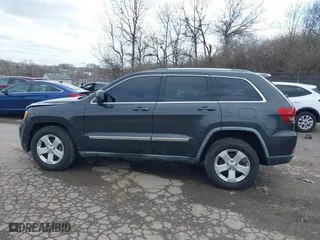2011 Jeep Grand Cherokee Laredo with VIN 1J4RR4GG7BC721483, listed as a IAAI auction lot 41810180 with 181,558 mi miles. Bid and sale history available at carsss.com. Image 15.