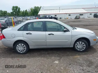 2007 Ford Focus S with VIN 1FAFP34N07W141693, listed as a IAAI auction lot 42310938 with 150,489 mi miles and . Bid and sale history available at DreamBid. Image 13.