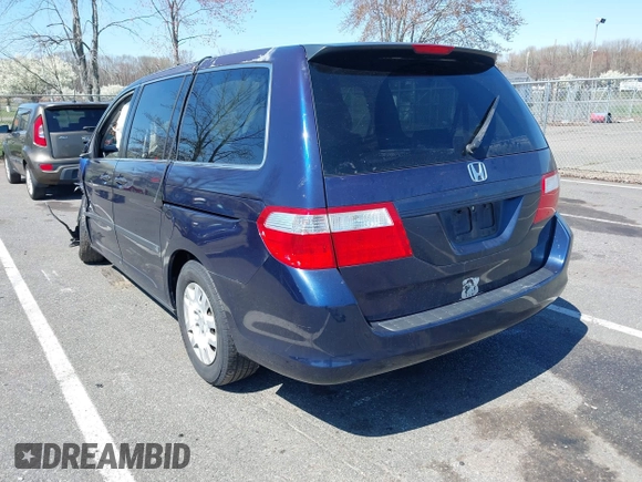 2007 Honda Odyssey LX with VIN 5FNRL38277B098798, listed as a IAAI auction lot 41998802 with 205,657 mi miles and . Bid and sale history available at carsss.com. Image 3.