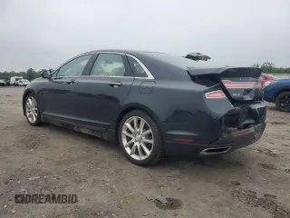 2014 Lincoln MKZ with VIN 3LN6L2J97ER817852, listed as a Copart auction lot 60980885 with 77,194 mi miles and Salvage title. Bid and sale history available at DreamBid. Image 2.