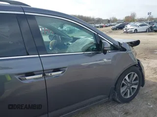 2016 Honda Odyssey Touring Elite z VIN 5FNRL5H99GB072860, wystawiony jako IAAI lot #42157603 z przebiegiem 221 449 mil mil oraz . Historia ofert i sprzedaży dostępna na DreamBid. Obrazek 6.