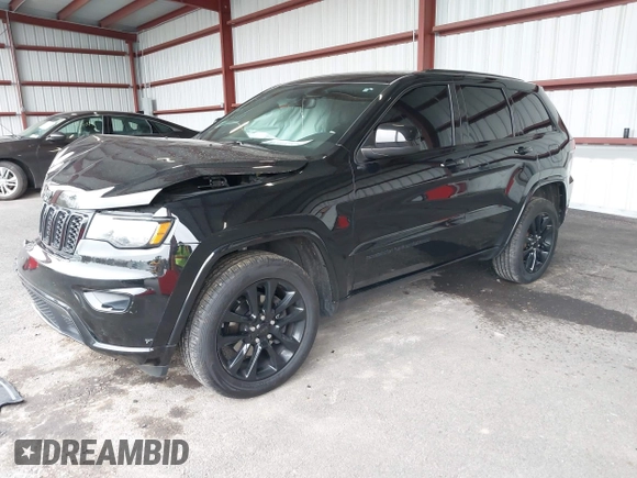 2019 Jeep Grand Cherokee Laredo E with VIN 1C4RJFAG0KC565739, listed as a IAAI auction lot 42039038 with 103,358 mi miles and . Bid and sale history available at DreamBid. Image 2.