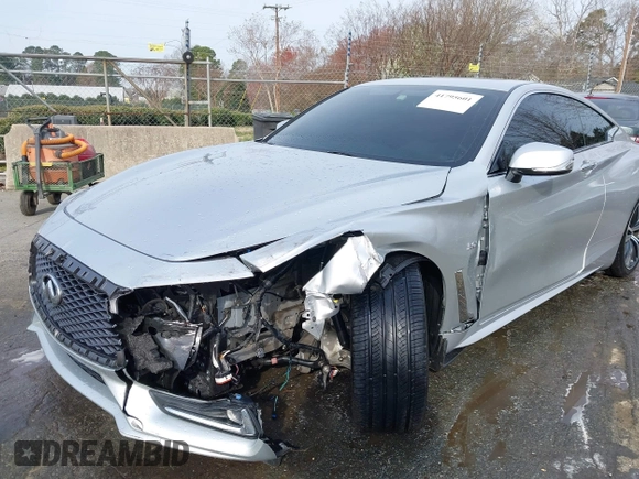 2018 Infiniti Q60 Luxe with VIN JN1EV7EK3JM343134, listed as a IAAI auction lot 41795601 with 61,826 mi miles and . Bid and sale history available at carsss.com. Image 6.
