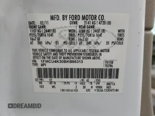 2011 Ford Escape Hybrid with VIN 1FMCU4K30BKB66313, listed as a Copart auction lot 58771165 with 297,214 mi miles and Salvage title. Bid and sale history available at DreamBid. Image 13.