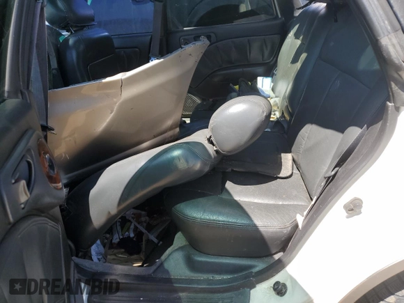 1999 Subaru Legacy Outback with VIN 4S3BG6855X7645042, listed as a Copart auction lot 55452095 with 159,874 mi miles and Salvage title. Bid and sale history available at DreamBid. Image 10.