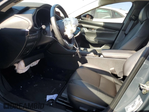 2023 Mazda 3 Premium Plus with VIN 3MZBPBEY5PM374977, listed as a Copart auction lot 70642804 with 9,029 mi miles and Salvage Title. Bid and sale history available at DreamBid. Image 7.