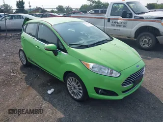 2014 Ford Fiesta Titanium z VIN 3FADP4FJXEM226724, wystawiony jako IAAI lot #42427106 z przebiegiem 63 302 mil mil oraz . Historia ofert i sprzedaży dostępna na DreamBid. Obrazek 1.