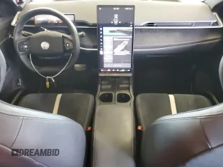 2023 Fisker Ocean One с VIN VCF1ZBU27PG005781, выставлен на аукционе Copart как лот 61660935 с пробегом 7 555 миль миль и Чистый • Clean title. История ставок и продаж доступна на DreamBid. Изображение 8.