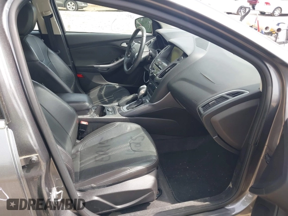 2014 Ford Focus Titanium with VIN 1FADP3N20EL422693, listed as a IAAI auction lot 42060024 with 97,371 mi miles and . Bid and sale history available at DreamBid. Image 5.