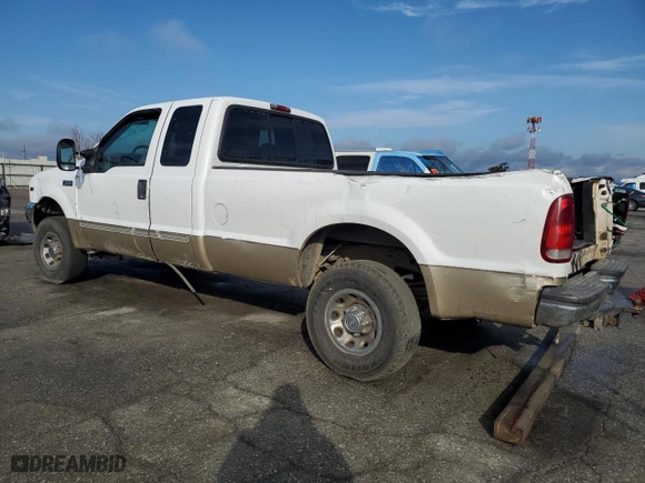 2000 Ford Super Duty F-250 XL with VIN 1FTNX21S1YEB62621, listed as a Copart auction lot 87630545 with 204,488 mi miles and Salvage Title. Bid and sale history available at carsss.com. Image 2.