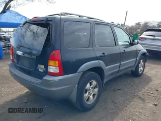2002 Mazda Tribute LX with VIN 4F2YU08152KM63439, listed as a IAAI auction lot 42108181 with 146,428 mi miles and . Bid and sale history available at carsss.com. Image 4.