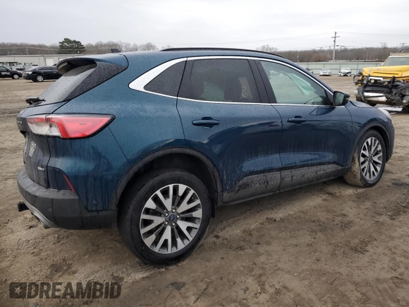 2020 Ford Escape Titanium z VIN 1FMCU9J91LUA73891, wystawiony jako Copart lot #89178475 z przebiegiem 35 579 mil mil oraz Szkoda całkowita • Salvage title. Historia ofert i sprzedaży dostępna na DreamBid. Obrazek 3.
