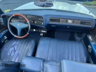 1973 Cadillac Eldorado z VIN 6L67S3Q410957, wystawiony jako Copart lot #64316435 z przebiegiem 74 584 mil mil oraz Czysty tytuł • Clean title. Historia ofert i sprzedaży dostępna na DreamBid. Obrazek 9.