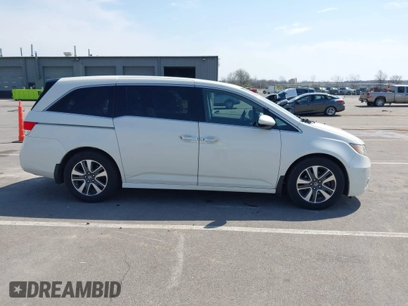 2016 Honda Odyssey Touring Elite with VIN 5FNRL5H97GB044278, listed as a IAAI auction lot 42056101 with 182,396 mi miles and . Bid and sale history available at DreamBid. Image 13.