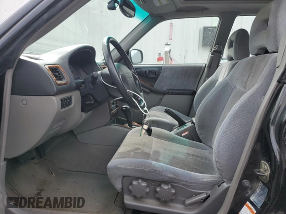 2001 Subaru Forester S w/Premium Pkg with VIN JF1SF656X1H725718, listed as a Copart auction lot 51517935 with 153,875 mi miles and Salvage Title. Bid and sale history available at carsss.com. Image 7.