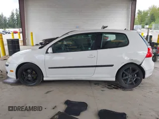 2007 Volkswagen Rabbit z VIN WVWBR71K67W191437, wystawiony jako IAAI lot #42082924 z przebiegiem 183 154 mil mil oraz . Historia ofert i sprzedaży dostępna na DreamBid. Obrazek 14.