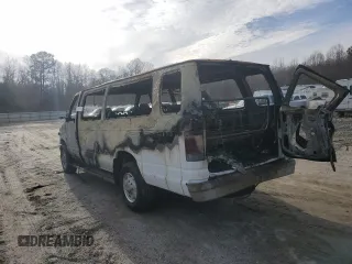 1996 Ford Econoline Wagon Super Custom z VIN 1FBJS31H5THA13695, wystawiony jako Copart lot #42136035 z przebiegiem Nie podano mil oraz Szkody całkowita. Historia ofert i sprzedaży dostępna na DreamBid. Obrazek 2.