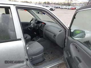 2001 Chevrolet Tracker z VIN 2CNBE13CX16947671, wystawiony jako IAAI lot #41894060 z przebiegiem 140 752 mil mil oraz . Historia ofert i sprzedaży dostępna na DreamBid. Obrazek 5.