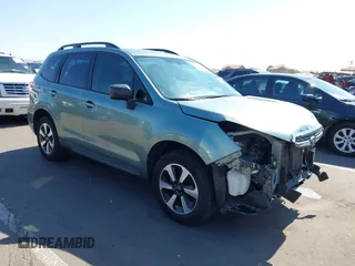 2018 Subaru Forester z VIN JF2SJABC1JH569219, wystawiony jako IAAI lot #42477344 z przebiegiem 80 709 mil mil oraz . Historia ofert i sprzedaży dostępna na DreamBid. Obrazek 1.