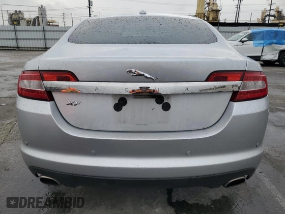 2009 Jaguar XF Premium Luxury with VIN SAJWA06B69HR43610, listed as a Copart auction lot 47394115 with 173,426 mi miles and Salvage Title. Bid and sale history available at DreamBid. Image 6.