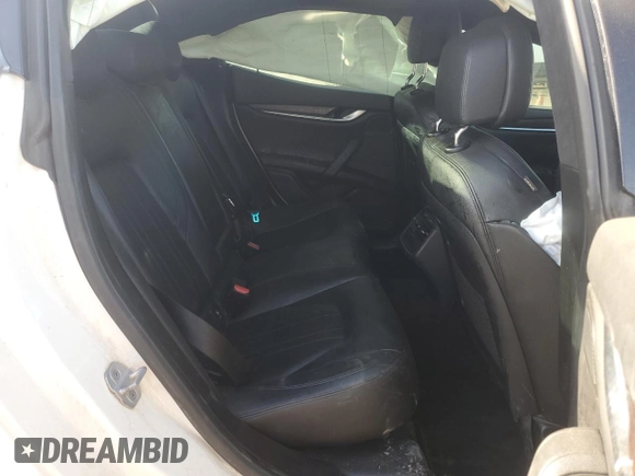 2014 Maserati Ghibli S Q4 z VIN ZAM57RTAXE1092970, wystawiony jako Copart lot #48617585 z przebiegiem 92 976 mil mil oraz Szkoda całkowita • Salvage title. Historia ofert i sprzedaży dostępna na DreamBid. Obrazek 10.